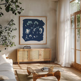 Nature By The Lake - Flowers IV by Piper Rhue. Shown in a natural wood frame in a cozy modern living room. Available as an archival giclee rolled canvas, fine art paper, or poster print. SKU 50092a.