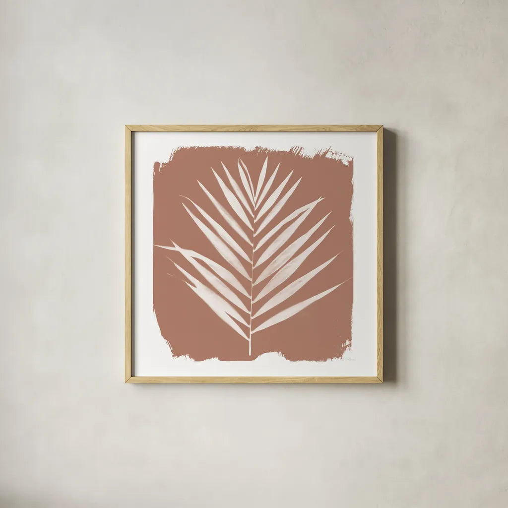 Nature by the Lake - Frond III Warm Sq by Piper Rhue. Shown in a natural wood glass frame for a timeless modern aesthetic. Available as an archival giclee rolled canvas, fine art paper, or poster print. SKU 60545a.