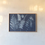 Nature by the Lake Ferns I Crop by Piper Rhue. shown as a paper print in a natural frame. Available as a archival giclee rolled canvas, fine art paper, or poster print. SKU 50083i.