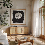 Nature by the Lake Flowers I Black by Piper Rhue. Shown in a natural wood frame in a cozy modern living room. Available as an archival giclee rolled canvas, fine art paper, or poster print. SKU 51199a.