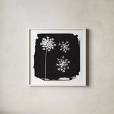 Nature by the Lake Flowers III Black by Piper Rhue. Shown in a crisp white glass frame for a clean and minimalist style. Available as an archival giclee rolled canvas, fine art paper, or poster print. SKU 51201a.
