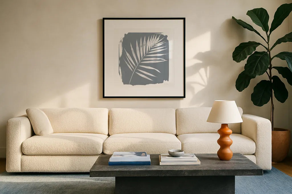 Nature by the Lake Frond II Sq Natural by Piper Rhue. Displayed in a glass frame with matte in a clean modern living room. Available as an archival giclee rolled canvas, fine art paper, or poster print. SKU 71824a.