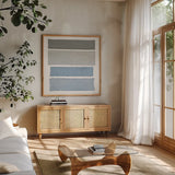 Painted Weaving I on White Sq by Piper Rhue. Shown in a natural wood frame in a cozy modern living room. Available as an archival giclee rolled canvas, fine art paper, or poster print. SKU 32579a.