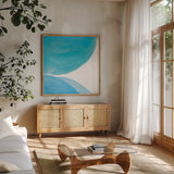 Pools of Turquoise II by Piper Rhue. Shown in a natural wood frame in a cozy modern living room. Available as an archival giclee rolled canvas, fine art paper, or poster print. SKU 34930a.