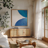 Pools of Turquoise III by Piper Rhue. Shown in a natural wood frame in a cozy modern living room. Available as an archival giclee rolled canvas, fine art paper, or poster print. SKU 34931a.
