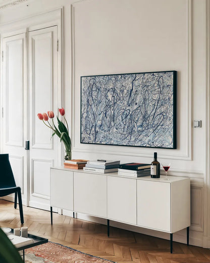 Shore Blues by Piper Rhue. shown as a framed stretched canvas in a living room above a console. Available as a archival giclee rolled canvas, fine art paper, or poster print. SKU 30301i.