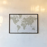 Spinning World by Piper Rhue. shown as a paper print in a black flame. Available as a archival giclee rolled canvas, fine art paper, or poster print. SKU 30567i.