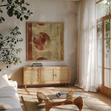 Caribbean Sunrise Square I by Roque Silva. Shown in a natural wood frame in a cozy modern living room. Available as an archival giclee rolled canvas, fine art paper, or poster print. SKU 12125a.