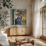 City Graffiti by Roque Silva. Shown in a natural wood frame in a cozy modern living room. Available as an archival giclee rolled canvas, fine art paper, or poster print. SKU 62307a.