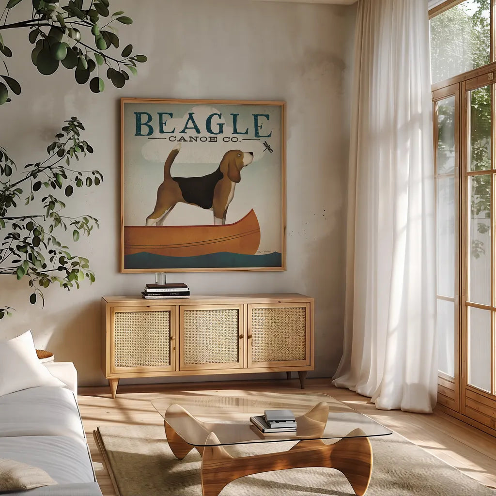 Beagle Canoe Co by Ryan Fowler. Shown in a natural wood frame in a cozy modern living room. Available as an archival giclee rolled canvas, fine art paper, or poster print. SKU 13366a.