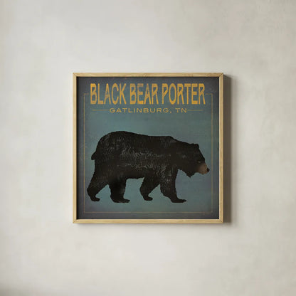 Black Bear Porter by Ryan Fowler. Shown in a natural wood glass frame for a timeless modern aesthetic. Available as an archival giclee rolled canvas, fine art paper, or poster print. SKU 30843a.