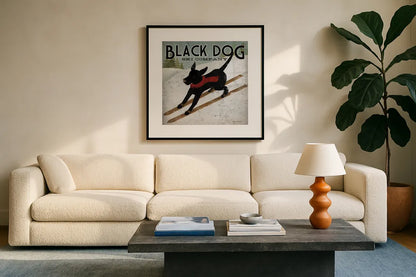 Black Dog Ski Co by Ryan Fowler. Displayed in a glass frame with matte in a clean modern living room. Available as an archival giclee rolled canvas, fine art paper, or poster print. SKU 5029a.