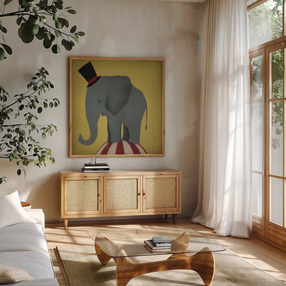 Circus Elephant by Ryan Fowler. Shown in a natural wood frame in a cozy modern living room. Available as an archival giclee rolled canvas, fine art paper, or poster print. SKU 21521a.
