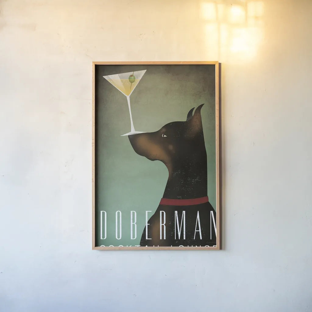 Doberman Martini by Ryan Fowler. shown as a paper print in a natural frame. Available as a archival giclee rolled canvas, fine art paper, or poster print. SKU 31277h.