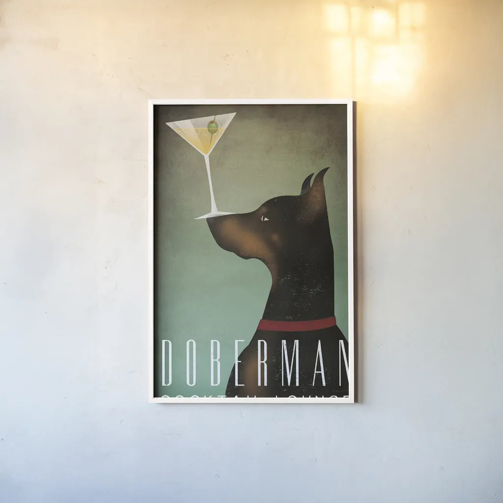 Doberman Martini by Ryan Fowler. shown as a paper print in a white frame. Available as a archival giclee rolled canvas, fine art paper, or poster print. SKU 31277h.