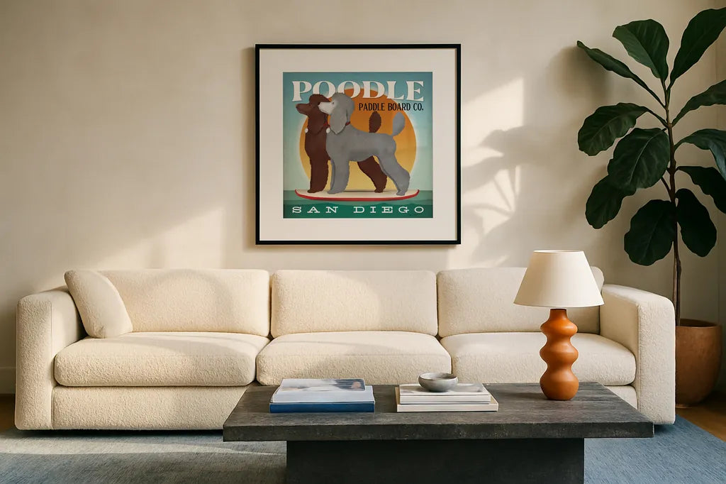 Double Poodle Paddle Board by Ryan Fowler. Displayed in a glass frame with matte in a clean modern living room. Available as an archival giclee rolled canvas, fine art paper, or poster print. SKU 79451a.