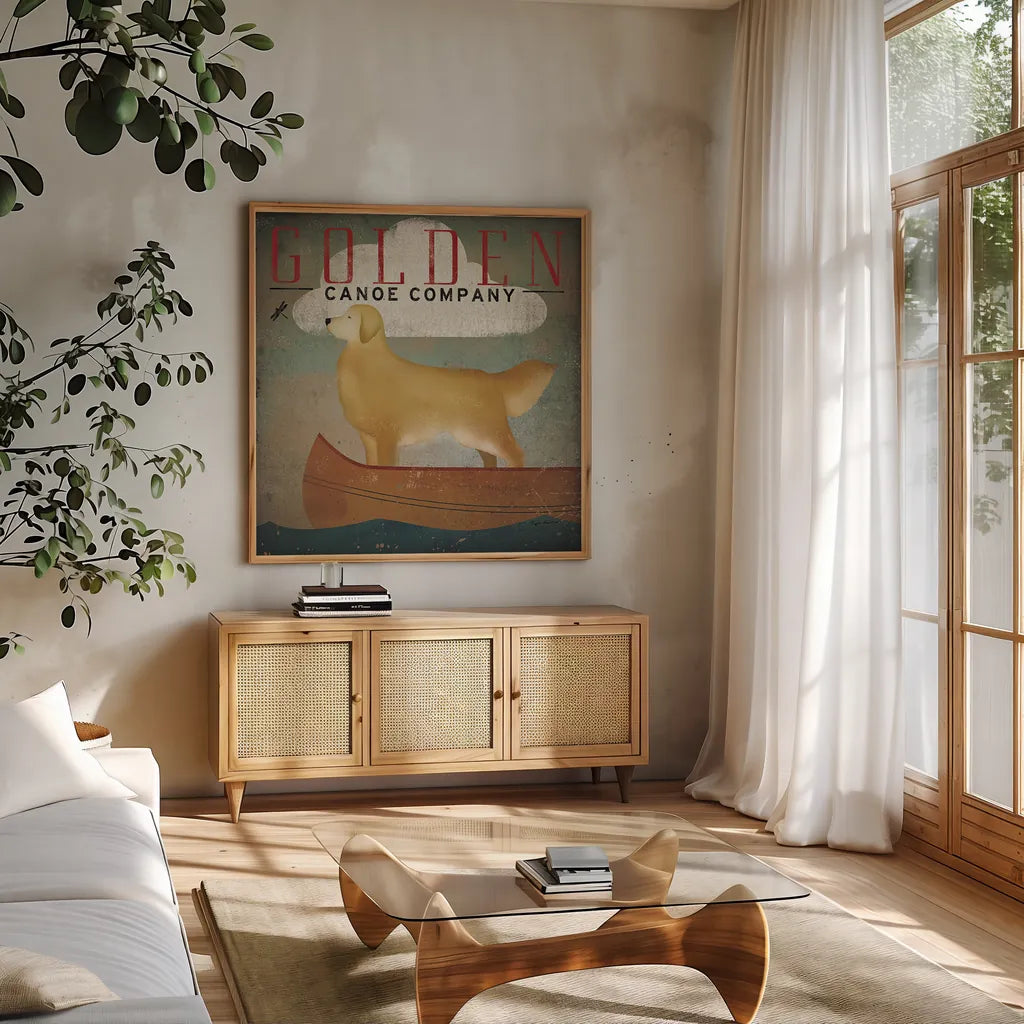 Golden Dog Canoe Co by Ryan Fowler. Shown in a natural wood frame in a cozy modern living room. Available as an archival giclee rolled canvas, fine art paper, or poster print. SKU 11276a.