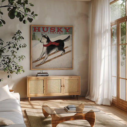 Husky Ski Co by Ryan Fowler. Shown in a natural wood frame in a cozy modern living room. Available as an archival giclee rolled canvas, fine art paper, or poster print. SKU 15015a.