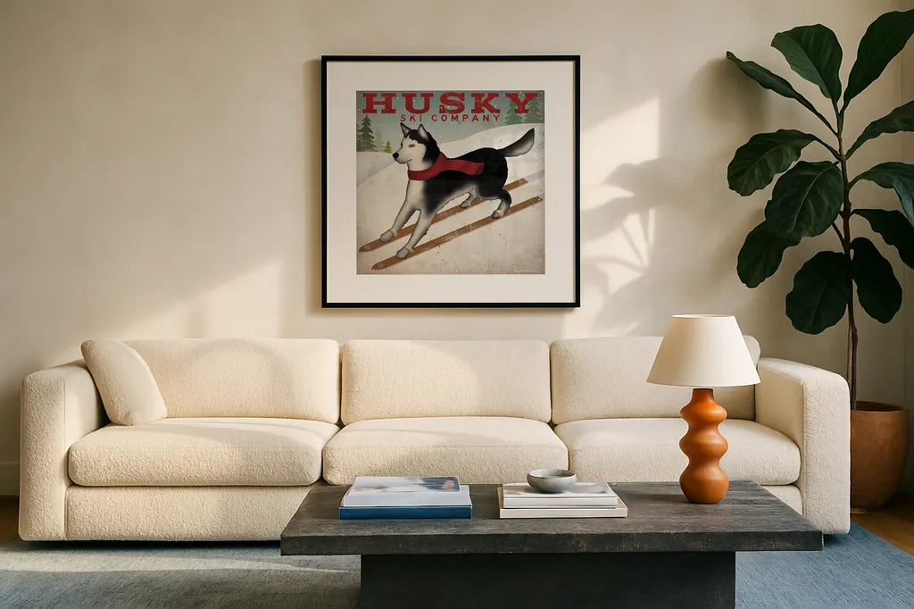 Husky Ski Co by Ryan Fowler. Displayed in a glass frame with matte in a clean modern living room. Available as an archival giclee rolled canvas, fine art paper, or poster print. SKU 15015a.