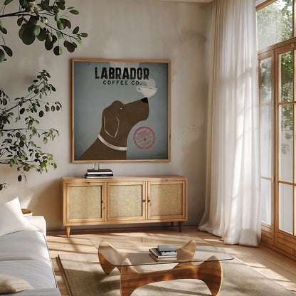 Labrador Coffee Co by Ryan Fowler. Shown in a natural wood frame in a cozy modern living room. Available as an archival giclee rolled canvas, fine art paper, or poster print. SKU 10002a.