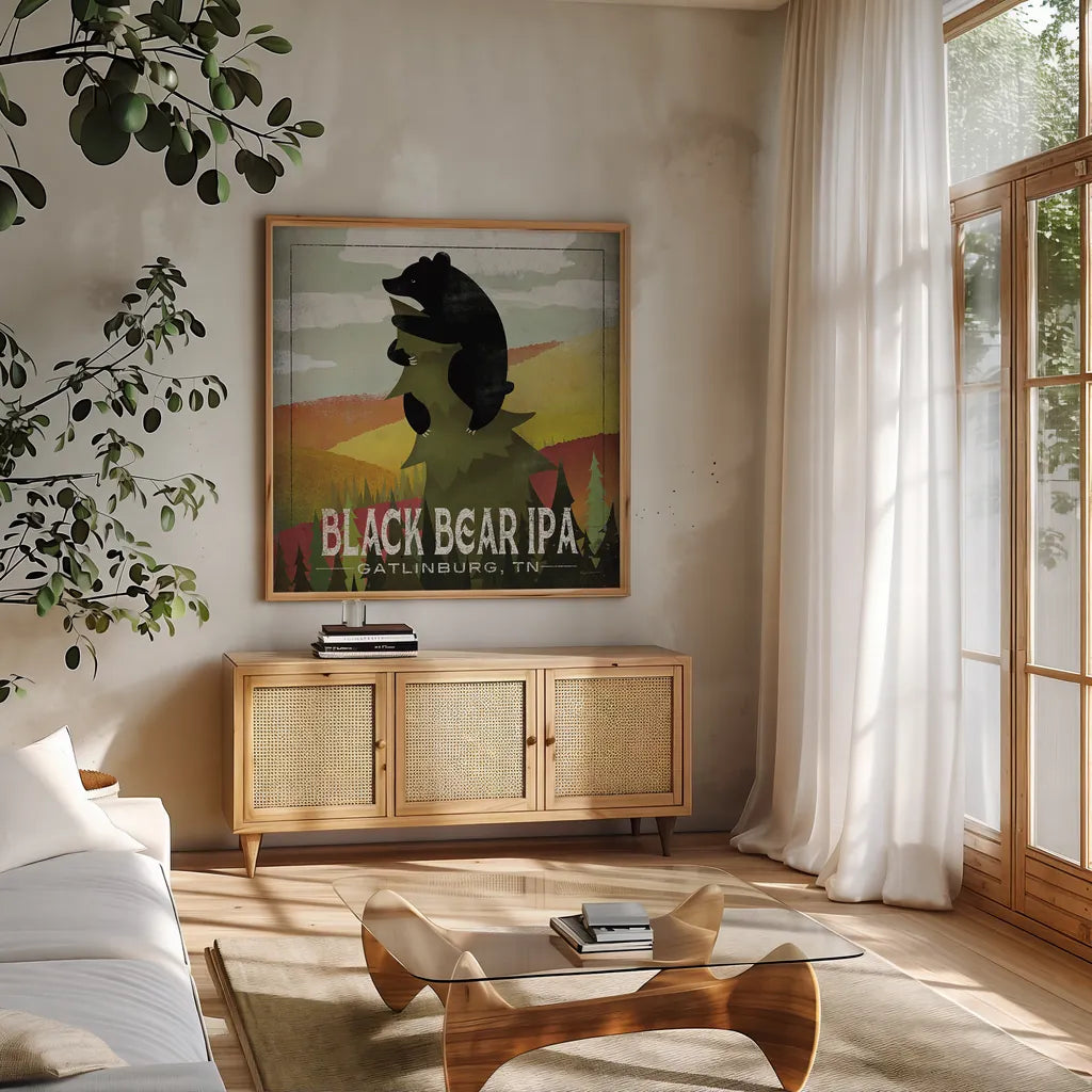 Leaf Peeper Black Bear IPA by Ryan Fowler. Shown in a natural wood frame in a cozy modern living room. Available as an archival giclee rolled canvas, fine art paper, or poster print. SKU 30844a.