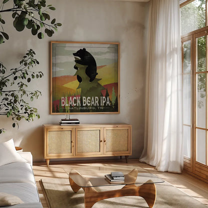 Leaf Peeper Black Bear IPA by Ryan Fowler. Shown in a natural wood frame in a cozy modern living room. Available as an archival giclee rolled canvas, fine art paper, or poster print. SKU 30844a.