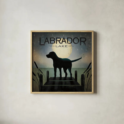 Moonrise Black Dog - Labrador Lake by Ryan Fowler. Shown in a natural wood glass frame for a timeless modern aesthetic. Available as an archival giclee rolled canvas, fine art paper, or poster print. SKU 11858a.
