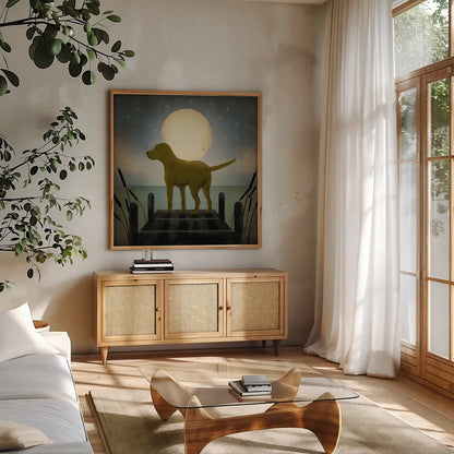 Moonrise Yellow Dog by Ryan Fowler. Shown in a natural wood frame in a cozy modern living room. Available as an archival giclee rolled canvas, fine art paper, or poster print. SKU 9034a.
