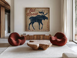 Old Moose Trading Co Tan - Dry Goods by Ryan Fowler. Shown as extra-large giant wall art in a modern living room. Available as an archival giclee rolled canvas, fine art paper, or poster print. SKU 35413a.