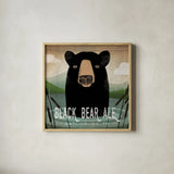 Skinny Dip Black Bear Ale by Ryan Fowler. Shown in a natural wood glass frame for a timeless modern aesthetic. Available as an archival giclee rolled canvas, fine art paper, or poster print. SKU 30845a.