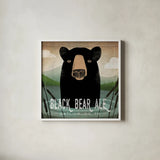 Skinny Dip Black Bear Ale by Ryan Fowler. Shown in a crisp white glass frame for a clean and minimalist style. Available as an archival giclee rolled canvas, fine art paper, or poster print. SKU 30845a.