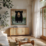 Skinny Dip Black Bear Ale by Ryan Fowler. Shown in a natural wood frame in a cozy modern living room. Available as an archival giclee rolled canvas, fine art paper, or poster print. SKU 30845a.