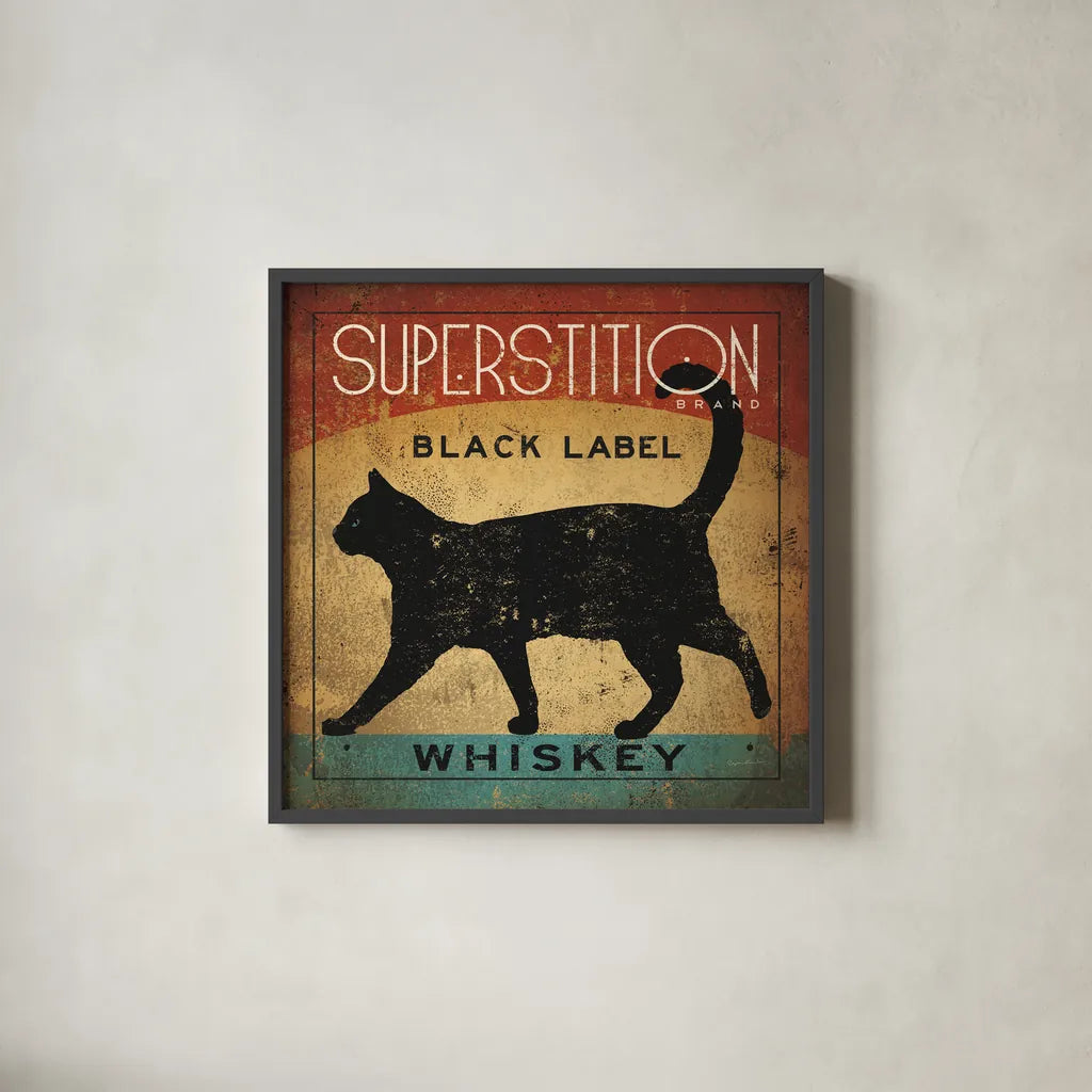 Superstition Black Label Whiskey Cat by Ryan Fowler. Shown in a sleek black glass frame for a contemporary gallery look. Available as an archival giclee rolled canvas, fine art paper, or poster print. SKU 28040a.