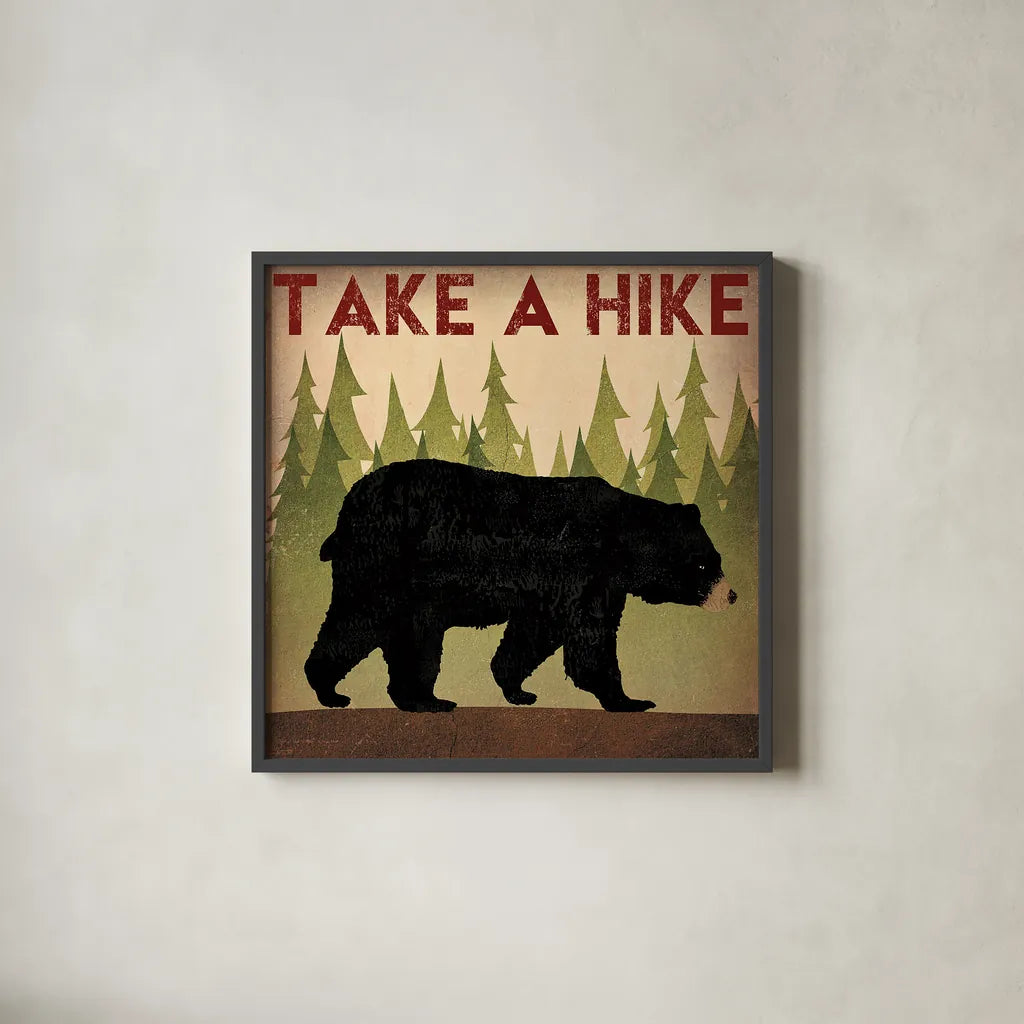 Take a Hike Black Bear by Ryan Fowler. Shown in a sleek black glass frame for a contemporary gallery look. Available as an archival giclee rolled canvas, fine art paper, or poster print. SKU 22891a.