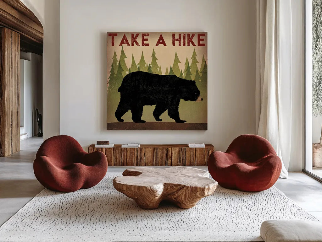 Take a Hike Black Bear by Ryan Fowler. Shown as extra-large giant wall art in a modern living room. Available as an archival giclee rolled canvas, fine art paper, or poster print. SKU 22891a.