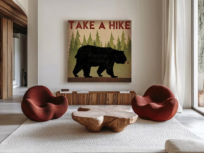 Take a Hike Black Bear by Ryan Fowler. Shown as extra-large giant wall art in a modern living room. Available as an archival giclee rolled canvas, fine art paper, or poster print. SKU 22891a.