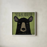 The Black Bear Pub by Ryan Fowler. Shown in a crisp white glass frame for a clean and minimalist style. Available as an archival giclee rolled canvas, fine art paper, or poster print. SKU 30842a.