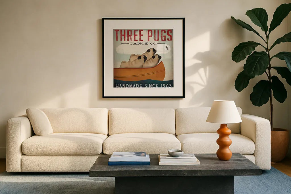 Three Pugs in a Canoe by Ryan Fowler. Displayed in a glass frame with matte in a clean modern living room. Available as an archival giclee rolled canvas, fine art paper, or poster print. SKU 22336a.