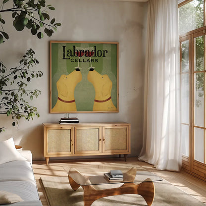 Two Labrador Wine Dogs Square by Ryan Fowler. Shown in a natural wood frame in a cozy modern living room. Available as an archival giclee rolled canvas, fine art paper, or poster print. SKU 12909a.