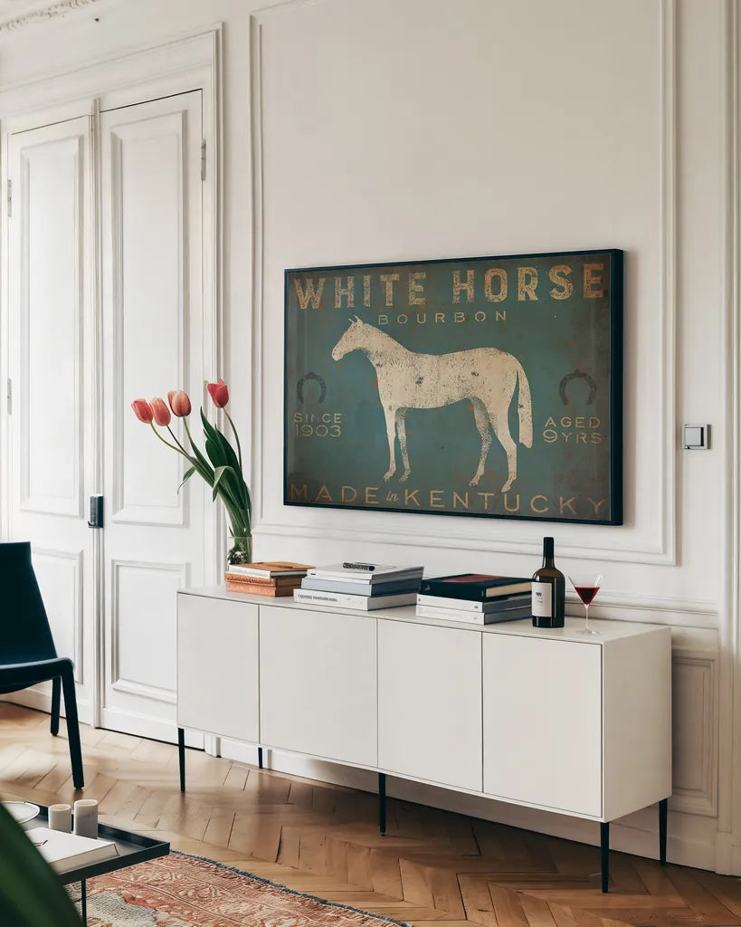 White Horse with Words Blue by Ryan Fowler. shown as a framed stretched canvas in a living room above a console. Available as a archival giclee rolled canvas, fine art paper, or poster print. SKU 22903i.