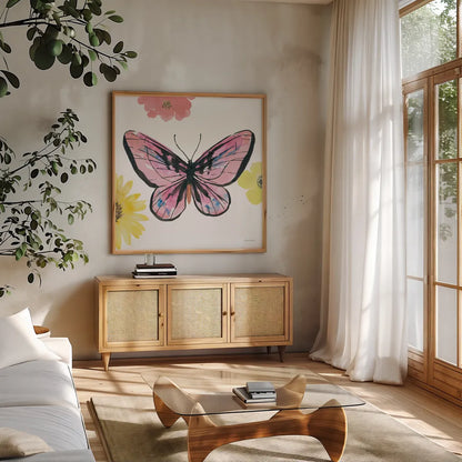 Beautiful Butterfly I Pink by Sara Zieve Miller. Shown in a natural wood frame in a cozy modern living room. Available as an archival giclee rolled canvas, fine art paper, or poster print. SKU 69759a.