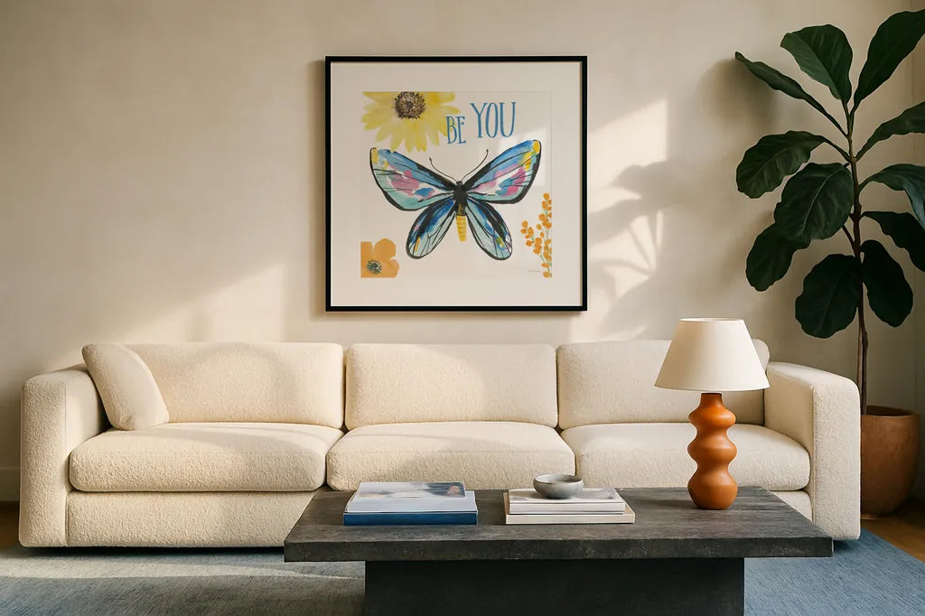 Beautiful Butterfly III Blue by Sara Zieve Miller. Displayed in a glass frame with matte in a clean modern living room. Available as an archival giclee rolled canvas, fine art paper, or poster print. SKU 66531a.