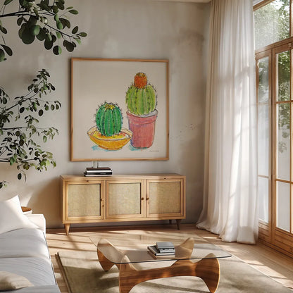 Cacti Garden III by Sara Zieve Miller. Shown in a natural wood frame in a cozy modern living room. Available as an archival giclee rolled canvas, fine art paper, or poster print. SKU 57356a.