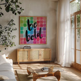 Color Quotes I by Sara Zieve Miller. Shown in a natural wood frame in a cozy modern living room. Available as an archival giclee rolled canvas, fine art paper, or poster print. SKU 31468a.