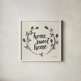 Happy to Bee Home I Words Neutral by Sara Zieve Miller. Shown in a crisp white glass frame for a clean and minimalist style. Available as an archival giclee rolled canvas, fine art paper, or poster print. SKU 54683a.