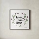Happy to Bee Home Words I by Sara Zieve Miller. Shown in a sleek black glass frame for a contemporary gallery look. Available as an archival giclee rolled canvas, fine art paper, or poster print. SKU 33594a.