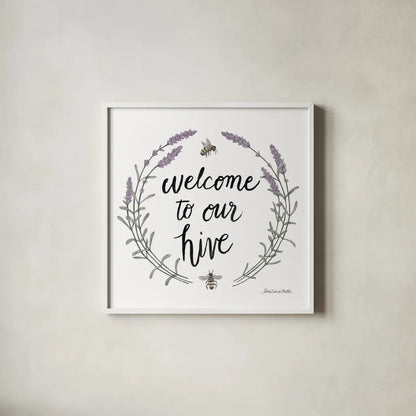 Happy to Bee Home Words II by Sara Zieve Miller. Shown in a crisp white glass frame for a clean and minimalist style. Available as an archival giclee rolled canvas, fine art paper, or poster print. SKU 33595a.