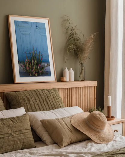 Santorini I by Sara Zieve Miller. shown as a paper print in a natural frame. Available as a archival giclee rolled canvas, fine art paper, or poster print. SKU 32111h.