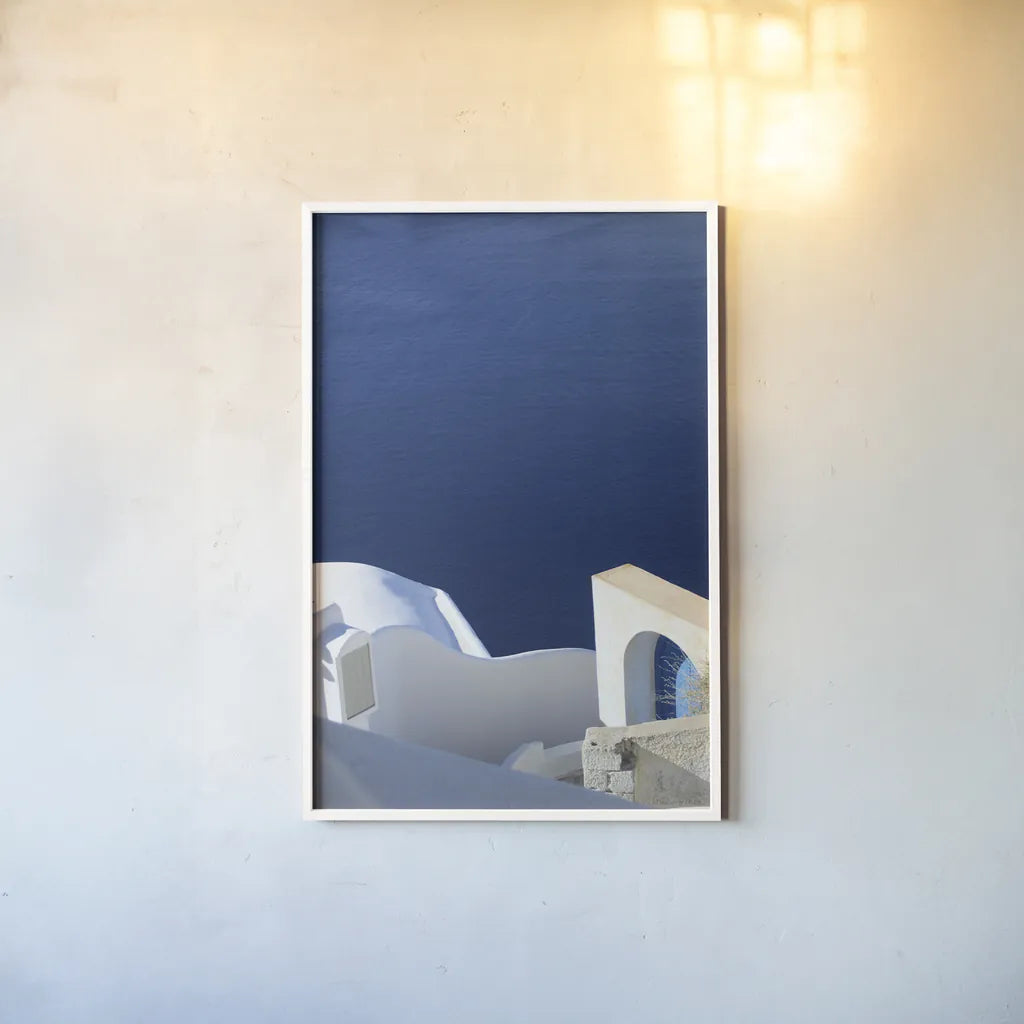 Santorini II by Sara Zieve Miller. shown as a paper print in a white frame. Available as a archival giclee rolled canvas, fine art paper, or poster print. SKU 32112h.