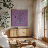 Something Wicked III by Sara Zieve Miller. Shown in a natural wood frame in a cozy modern living room. Available as an archival giclee rolled canvas, fine art paper, or poster print. SKU 58087a.